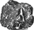Black charcoal stone at the base of Nimbu-Mirchi charm